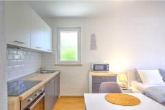 Anmarie Appartementen Appartement 4 – Patio foto 3