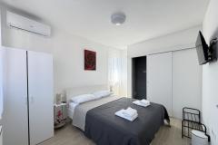 Flowers Appartementen Pula Slaapkamer 6 – Rose foto 1