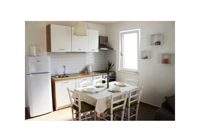 Laura apartmani – foto 3